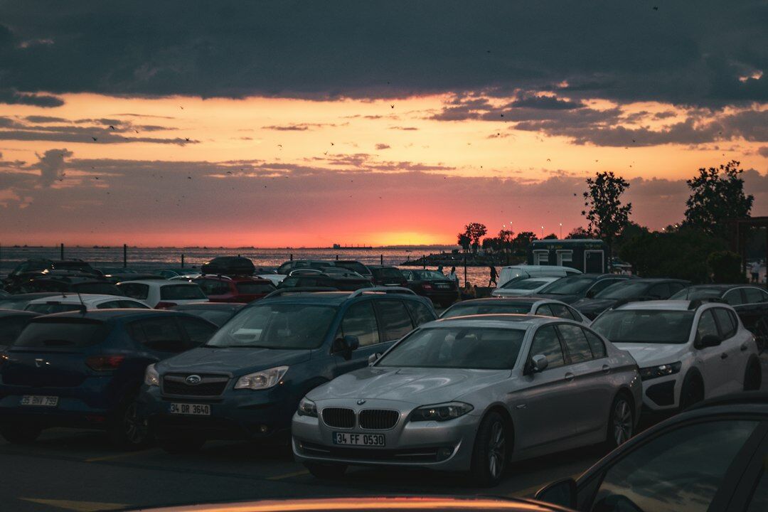 Exotic sports cars parked along the coastline of Punta del Este during summer