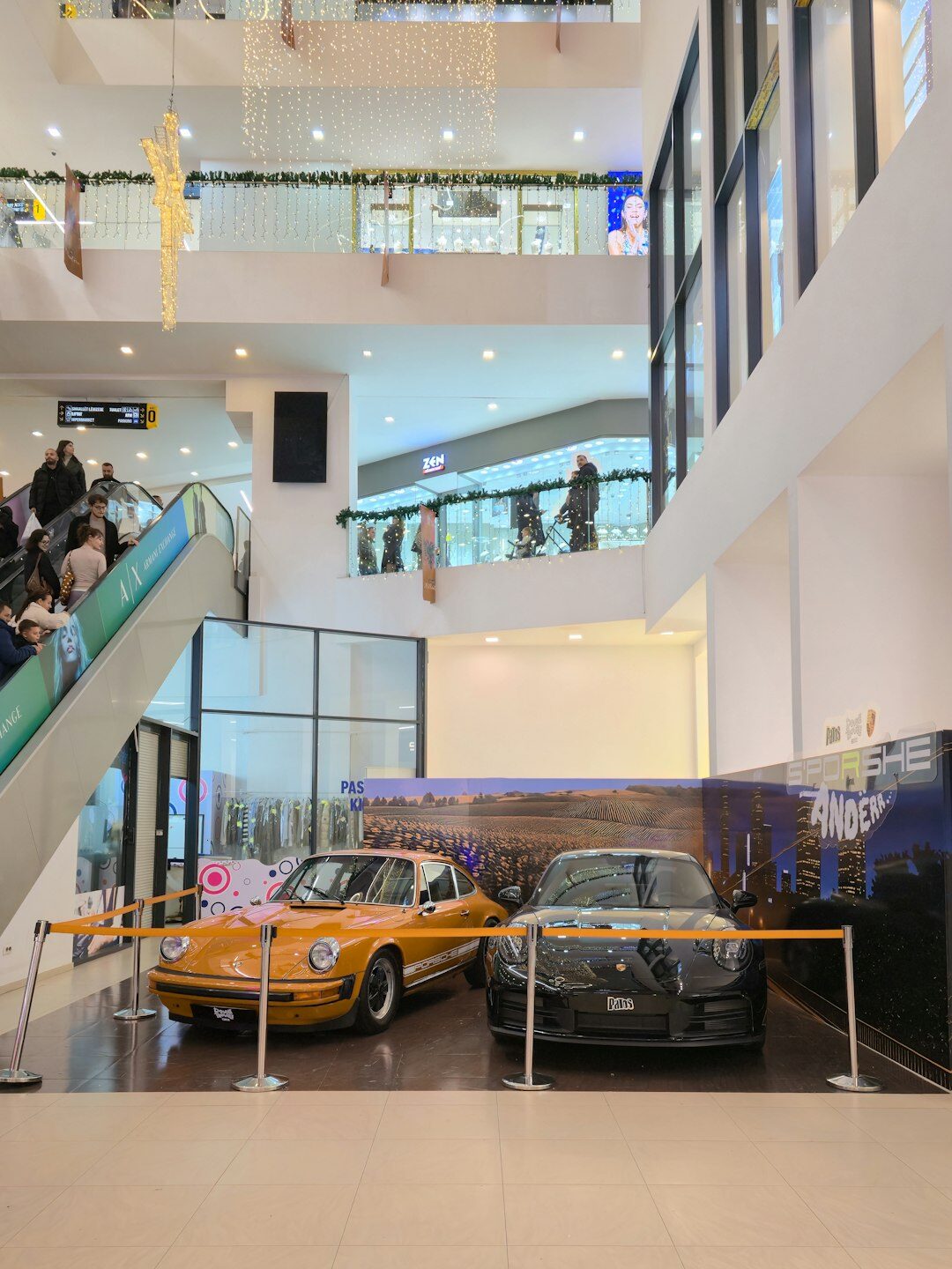 Modern exhibition hall in Maldonado showcasing hypercars under dramatic lighting