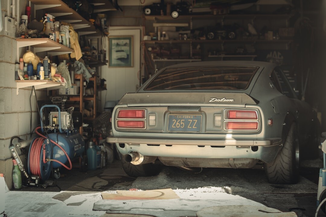 Interior of a fascinating vintage garage in Montevideo filled with automotive memorabilia