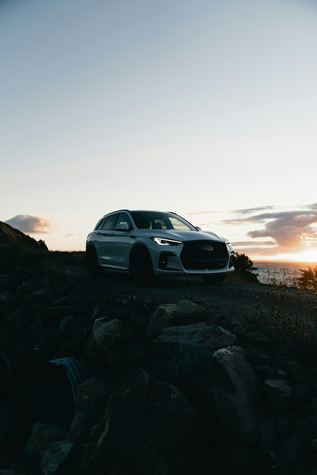 luxury car driving scenic road